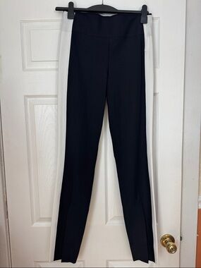 ATHLETA women’s  Black fitted pants with White Side Panels, size 4